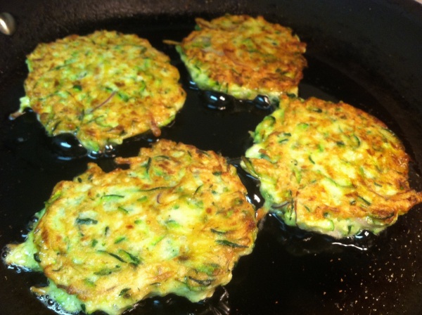 Fry zucchini cakes for 3 or 4 minutes on each side or until golden and crispy.